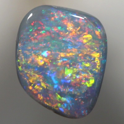 SOLID SEMI BLACK OPAL Sparkling red and orange over green blue